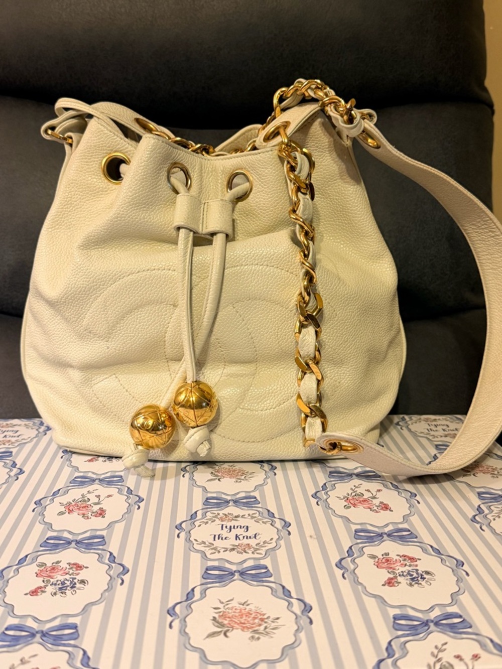 Authentic CHANEL Cream White Leather Drawstring Bucket Bag with Gold Chain